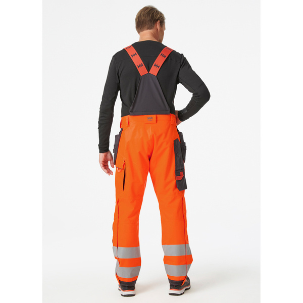 Spodnie zimowe odblaskowe Helly Hansen 71491_269 ALNA 2.0 CONSTRUCTION BIB kolor pomarańczowy